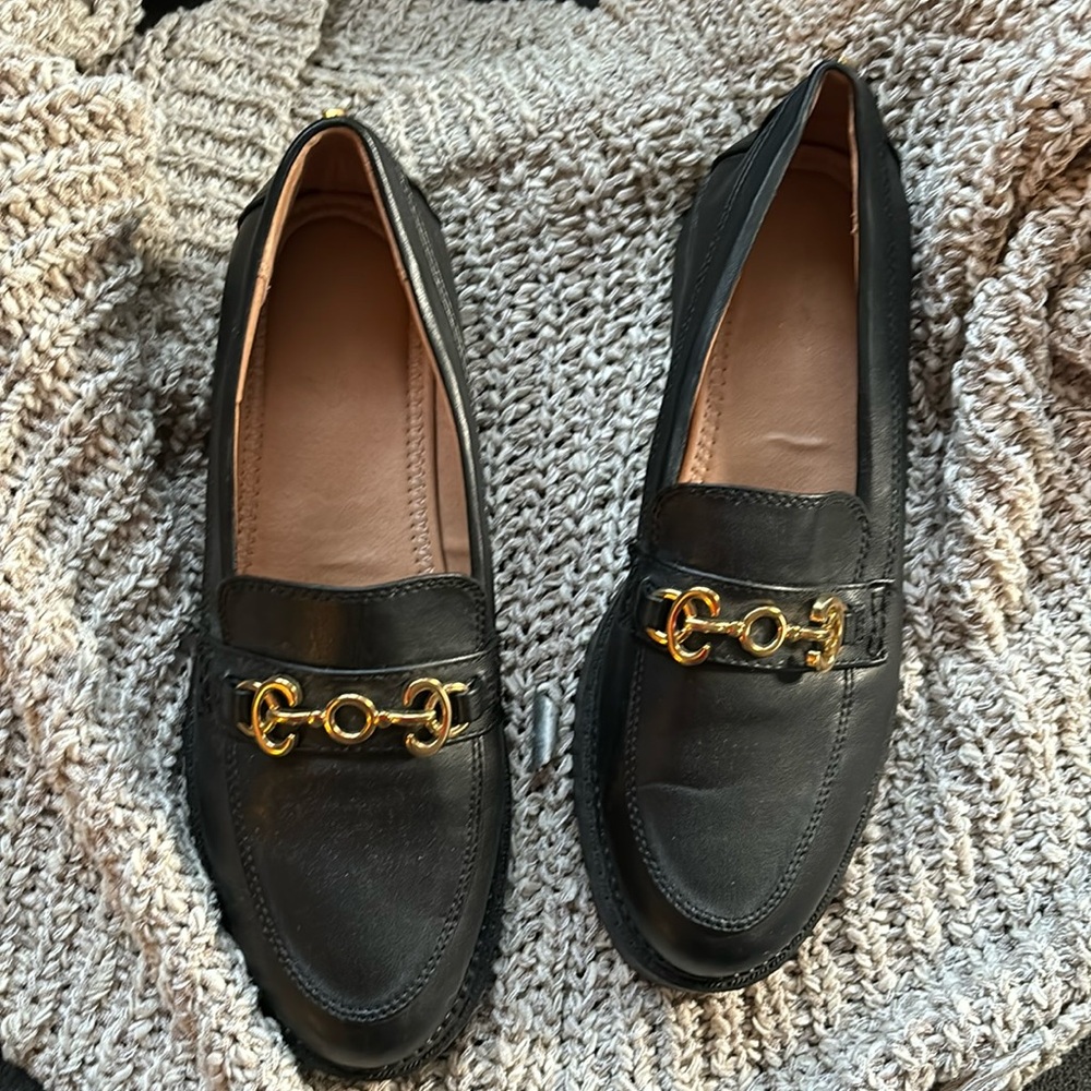 Black Lug sole loafers.